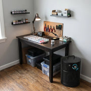 tools & craft room with black AllerAir airmed 1 compact air purifier
