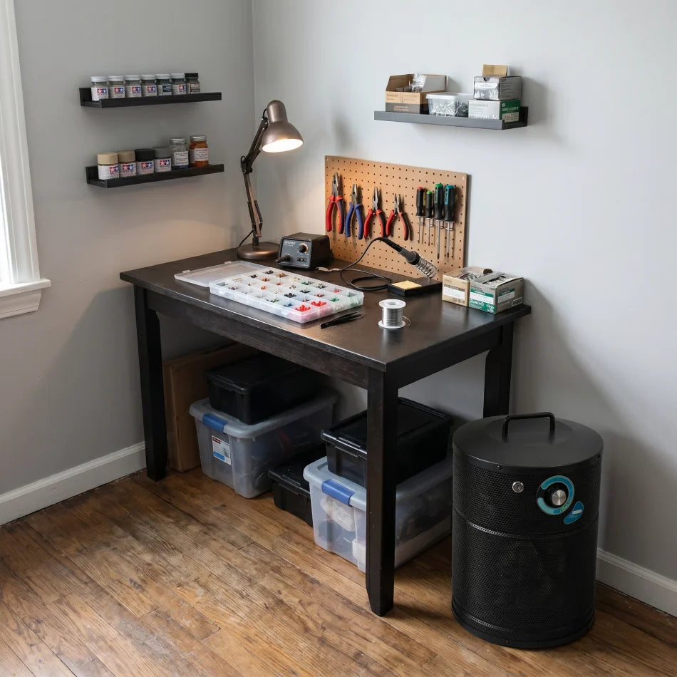 tools & craft room with black AllerAir airmed 1 compact air purifier