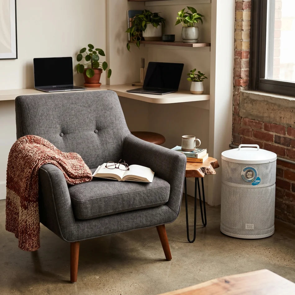 corner of room with armchair and Allerair airmed 3 air purifier